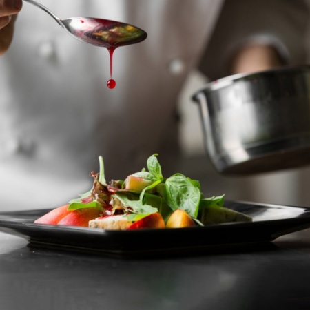 Chef plating food