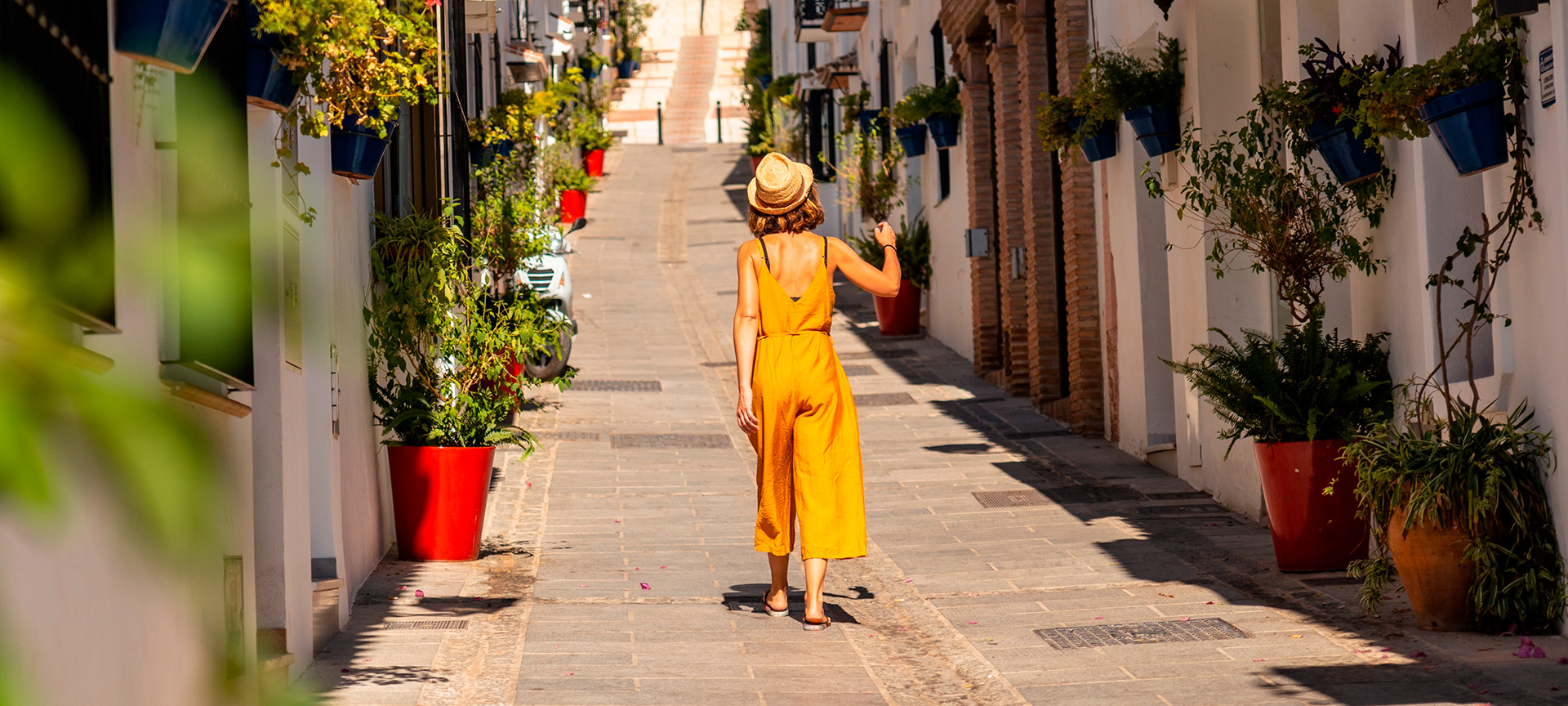 Tourist walking in the municipality of Mijas in Malaga, Andalusia Tourist walking in the municipality of Mijas in Malaga, Andalusia