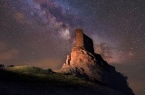 Milky way over the Zafra castle in Guadalajara, Castilla-La Mancha