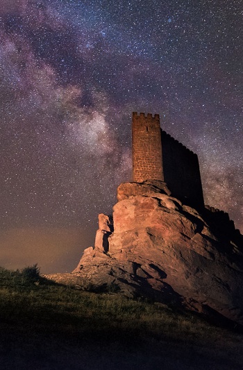 Milky way over the Zafra castle in Guadalajara, Castilla-La Mancha