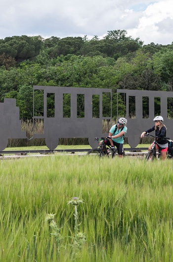 Tourists on a greenway in Girona, Catalonia